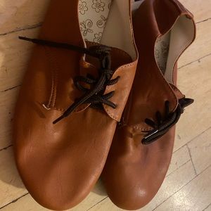 Brown lace up flats
